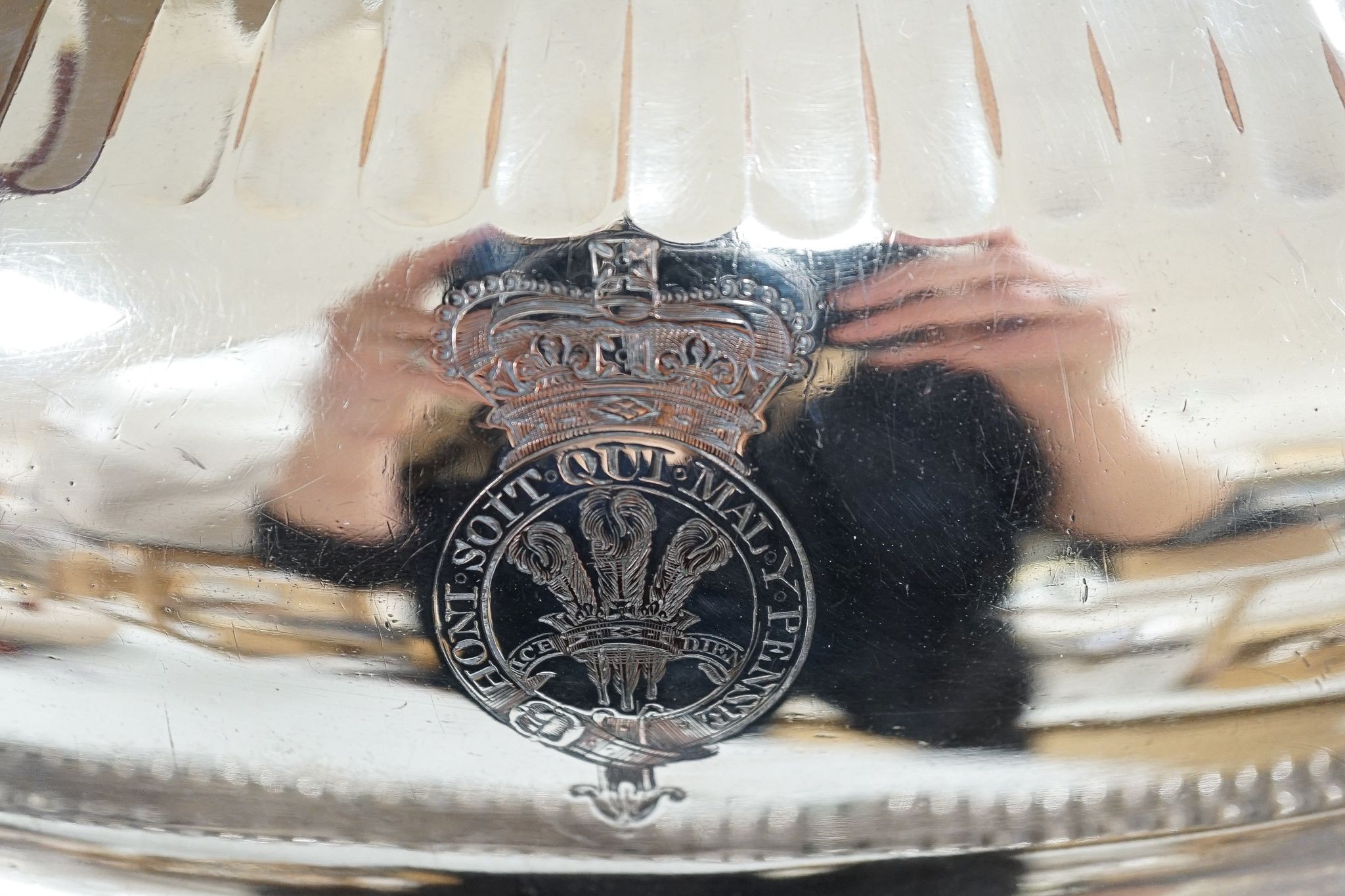 Two Victorian electroplate meat domes, and a hot water meat dish, 62 cms wide including handles.